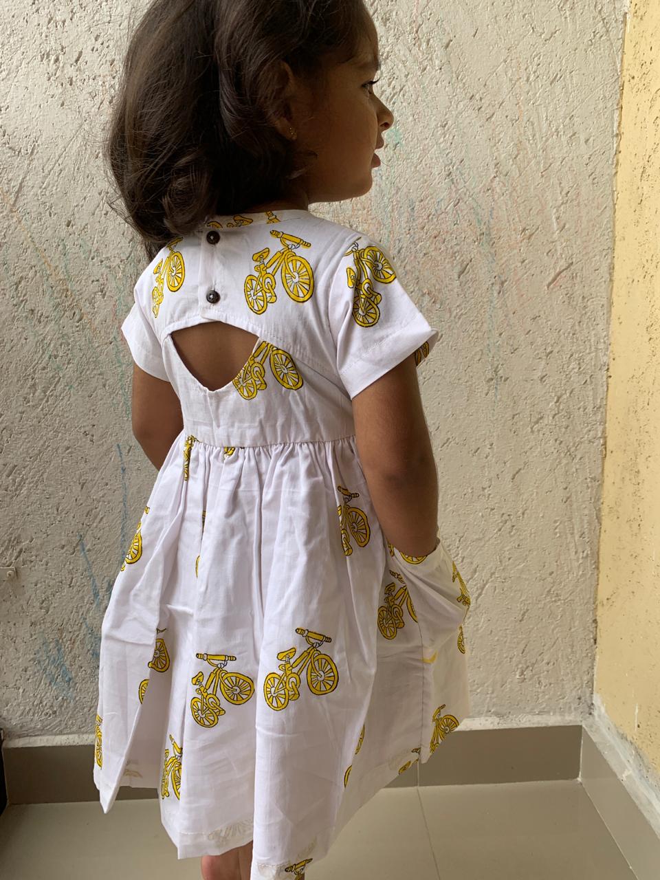 Snowflake Pockets + Peephole back dress