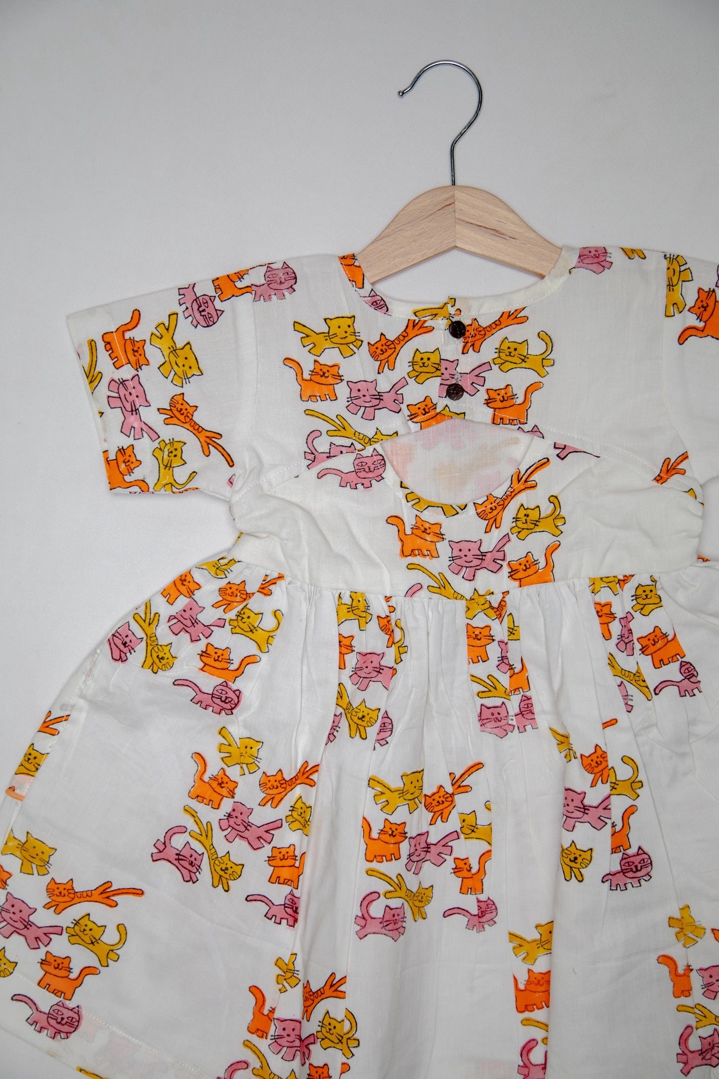 Cat Pockets + Peep hole back dress